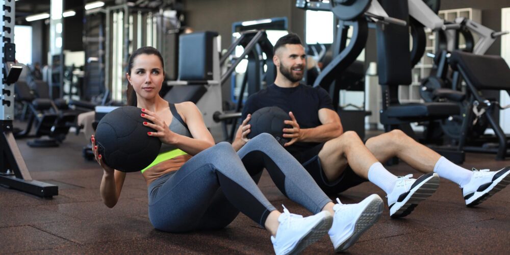 Couple working out in the fitness center